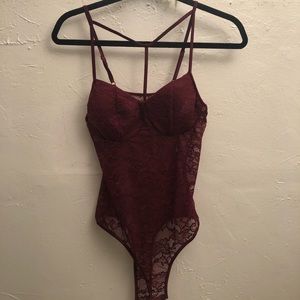Purple lace body suit